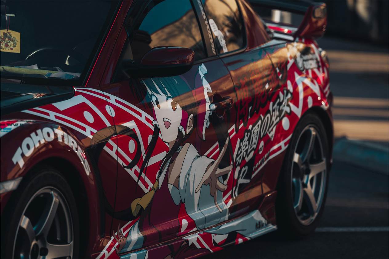car-show-design-what-a-designer-notices Close up of anime car wrap design at a car show