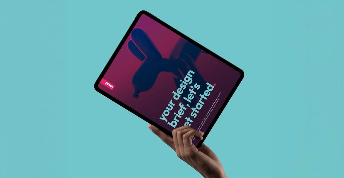A hand holding a tablet displaying the Level design brief template — download it to brief a designer
