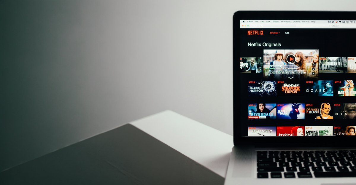 Netflix homepage on a laptop representing AI recommendation algorithms in everyday life